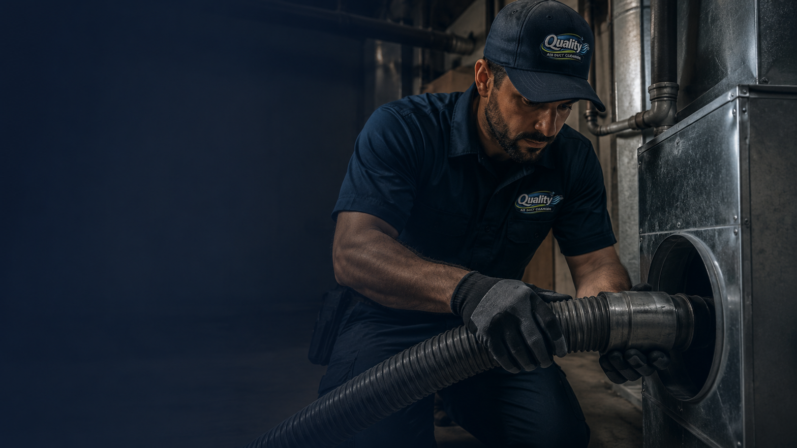 Quality Air technician cleaning HVAC ductwork with professional equipment